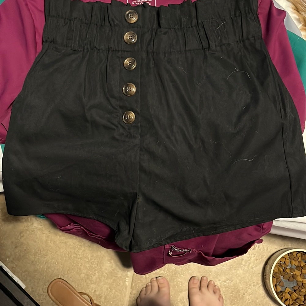 These are high waisted black shorts. For a casual or even fancy occasions.